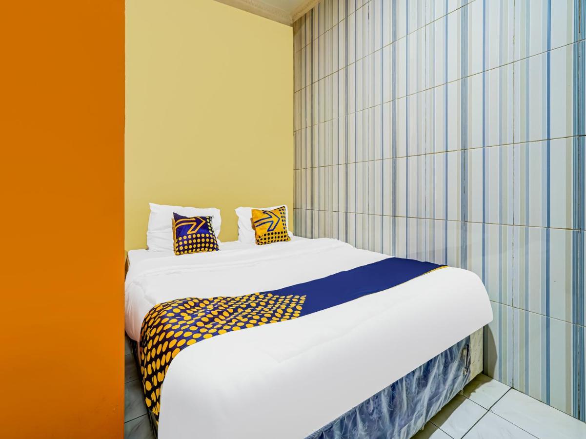 Hotel Spot On 91186 Losmen Yanti à Bandung Extérieur photo